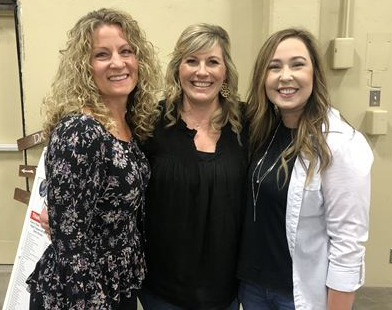3 women smiling